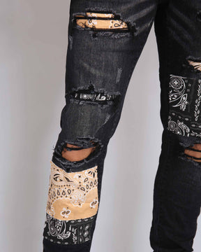 Ripped Black Jeans with Orange & Black Cashew Flowers Patch