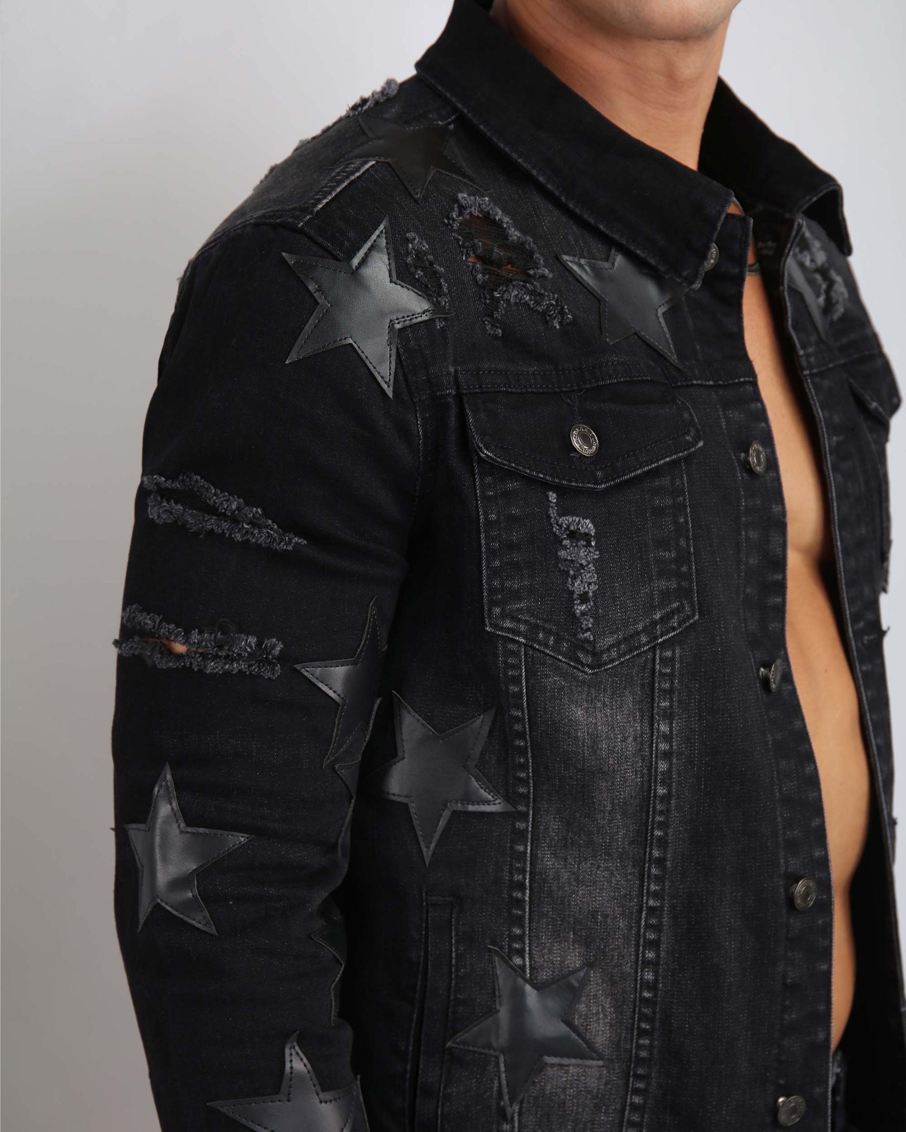 Ripped Black Denim Jacket with Star Patches