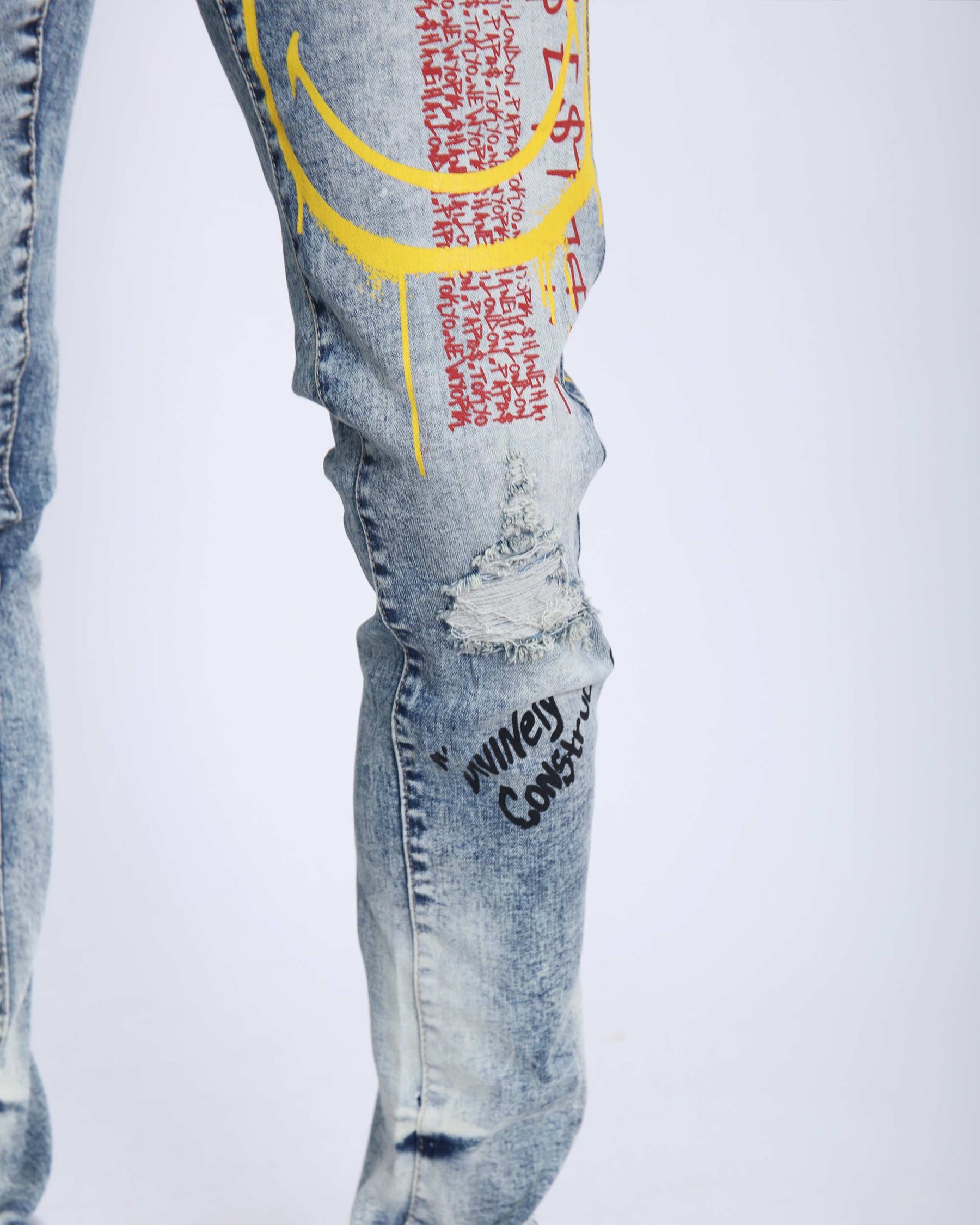 Light Wash Irregular Ripped Blue Jeans with Color Print