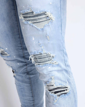 Distressed Blue Ripped Jeans with Exquisite Embroidery