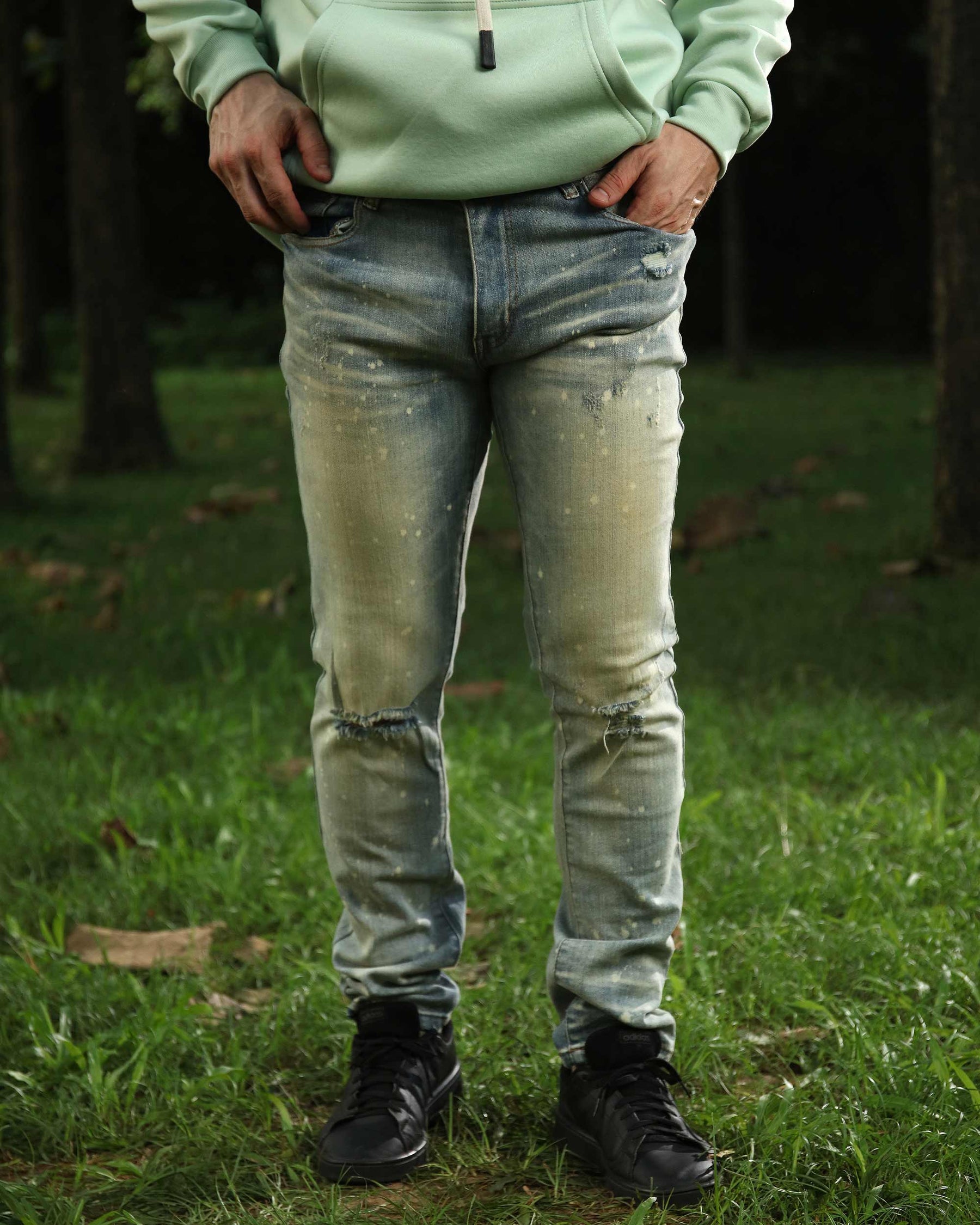 Distressed Blue Ripped Jeans with spray-painted