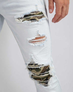 Light Wash Ripped Blue Jeans with Camouflage Patch