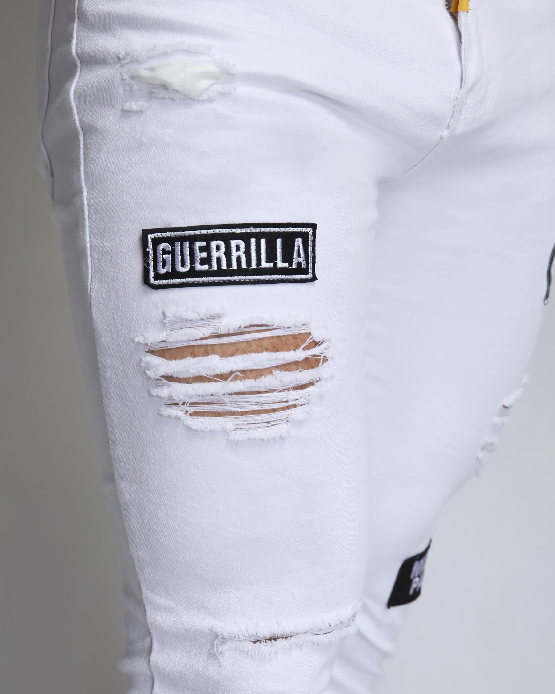 Skinny White Ripped Jeans with Letters Badge