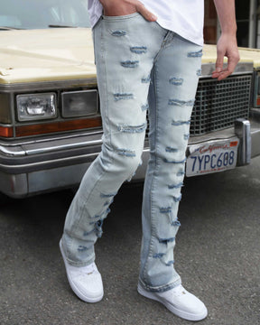 Light Wash Blue Flared Jeans with Cut-to-Shape Ripped