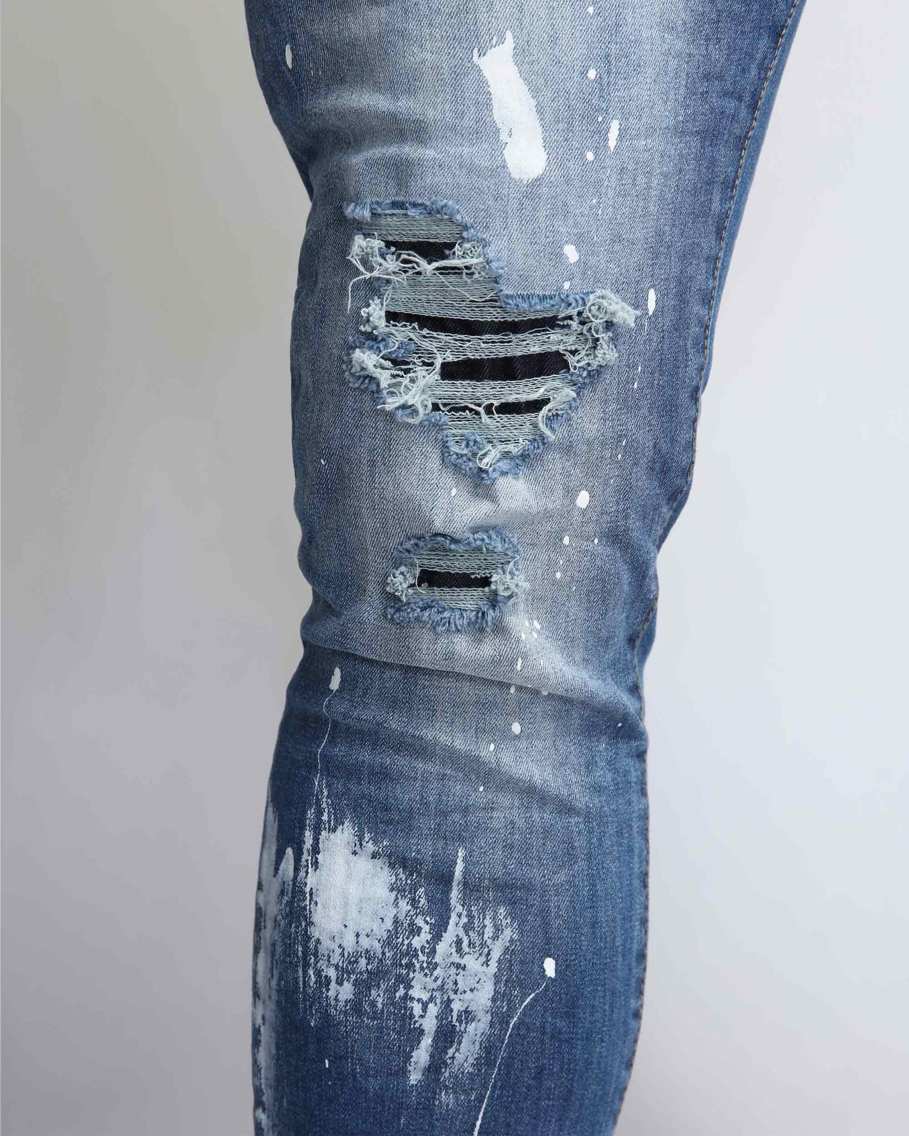 Irregular Paint Blue Ripped Jeans in Medium Wash