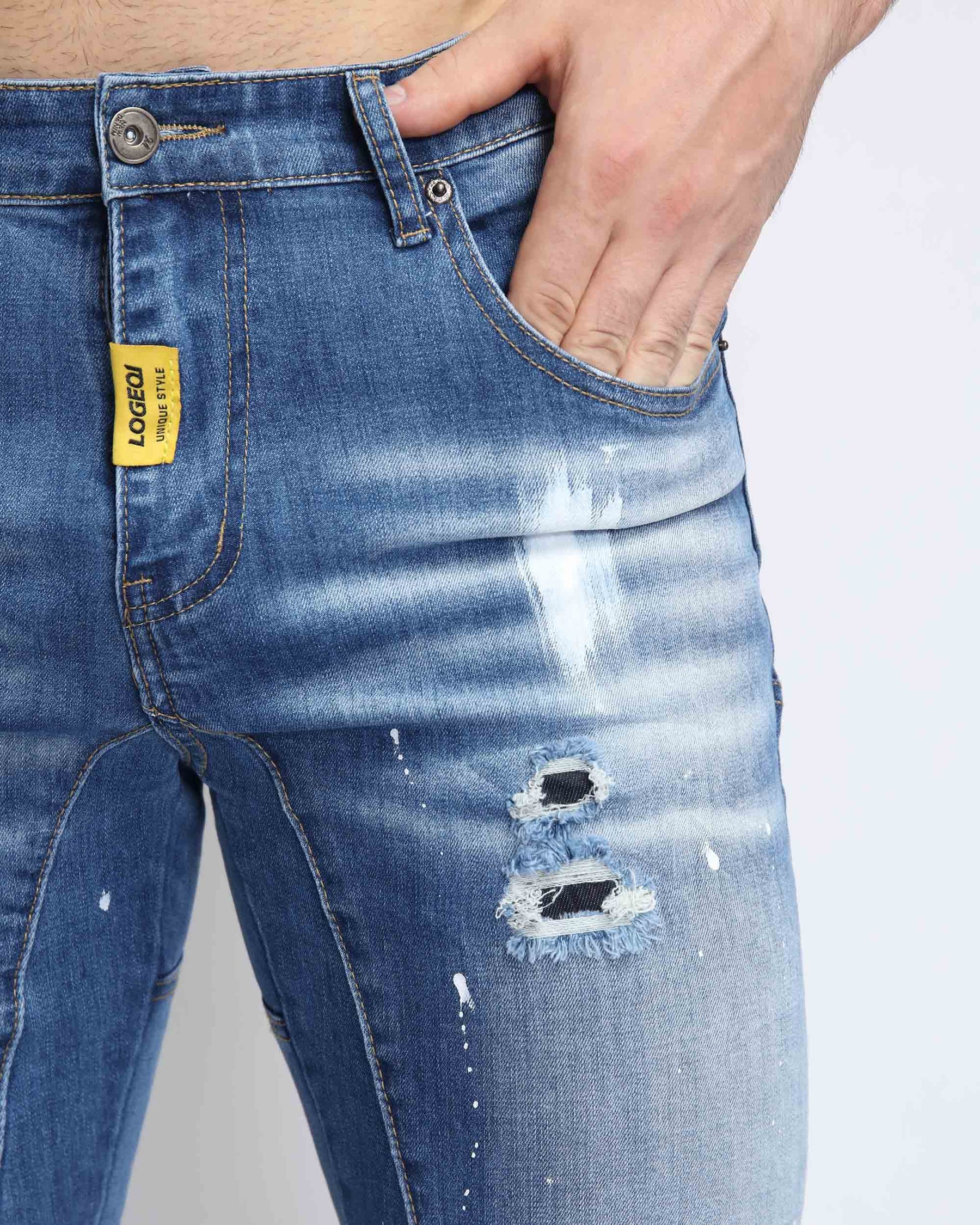 Spray Paint Ripped Blue Jeans with Medium Wash