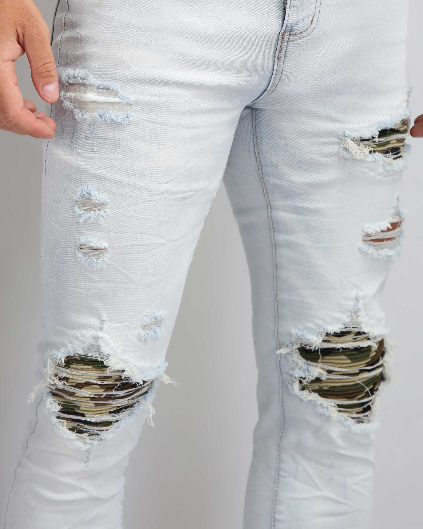 Light Wash Ripped Blue Jeans with Camouflage Patch