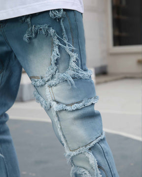 Irregular Blue Flared Jeans with Fringe