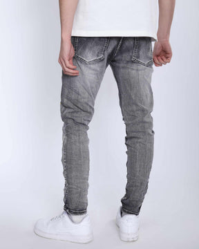 Gray Slim Fit Jeans with Graffiti Style Ripped Design