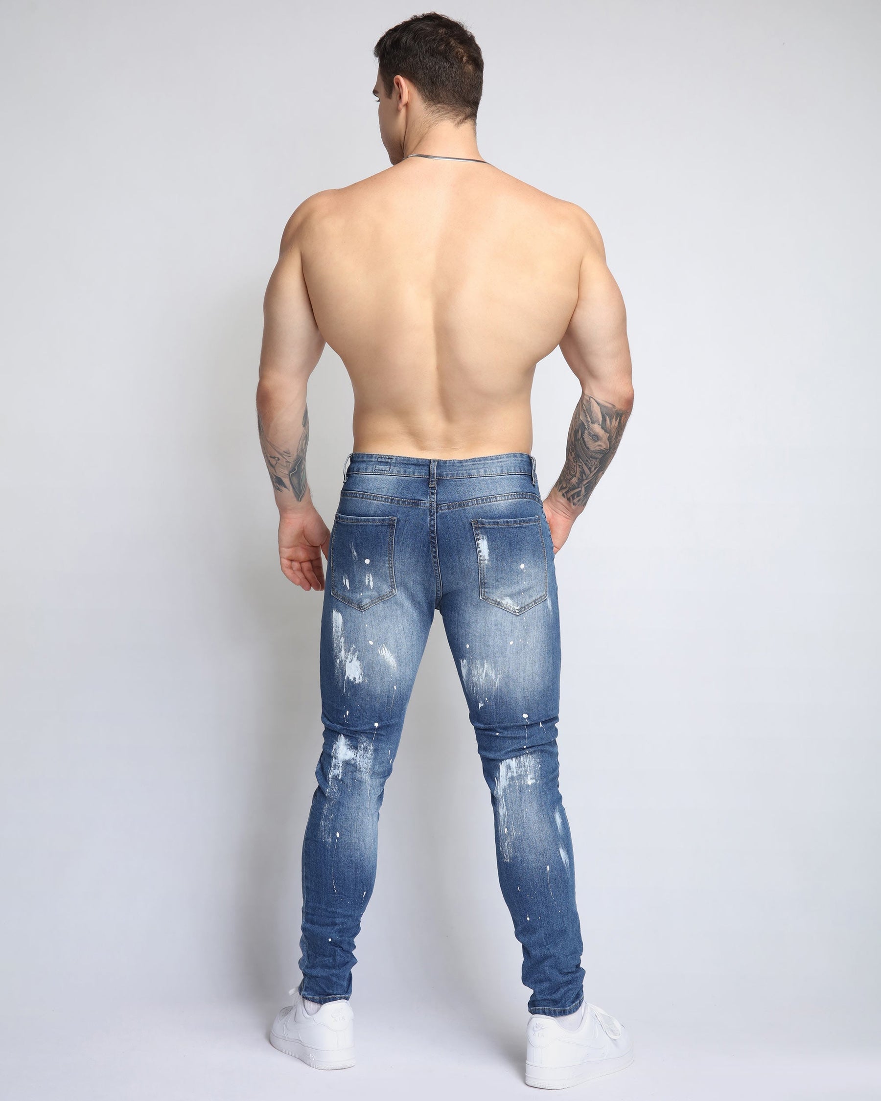 Irregular Paint Blue Ripped Jeans in Medium Wash