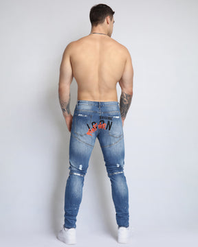Spray Paint Ripped Blue Jeans with Medium Wash