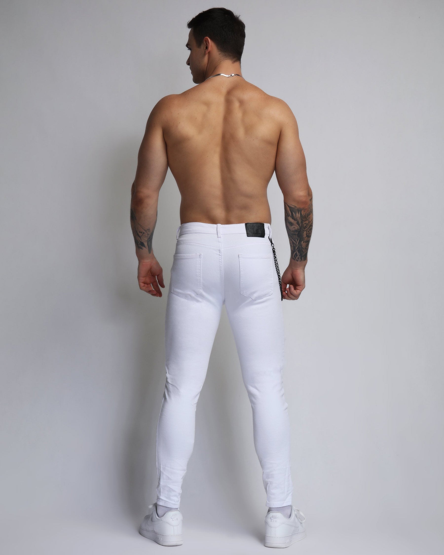 Large Ripped White Jeans with Black Patches