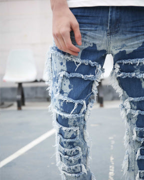 Tie-Dye Flared Jeans with Fringe Detailing