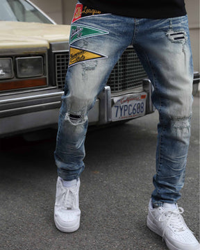 Medium Wash Blue Distressed Jeans with Flag Patch