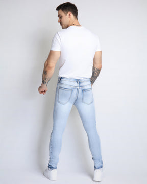 Trendy Distressed Blue Jeans with Ripped Knees & Patches