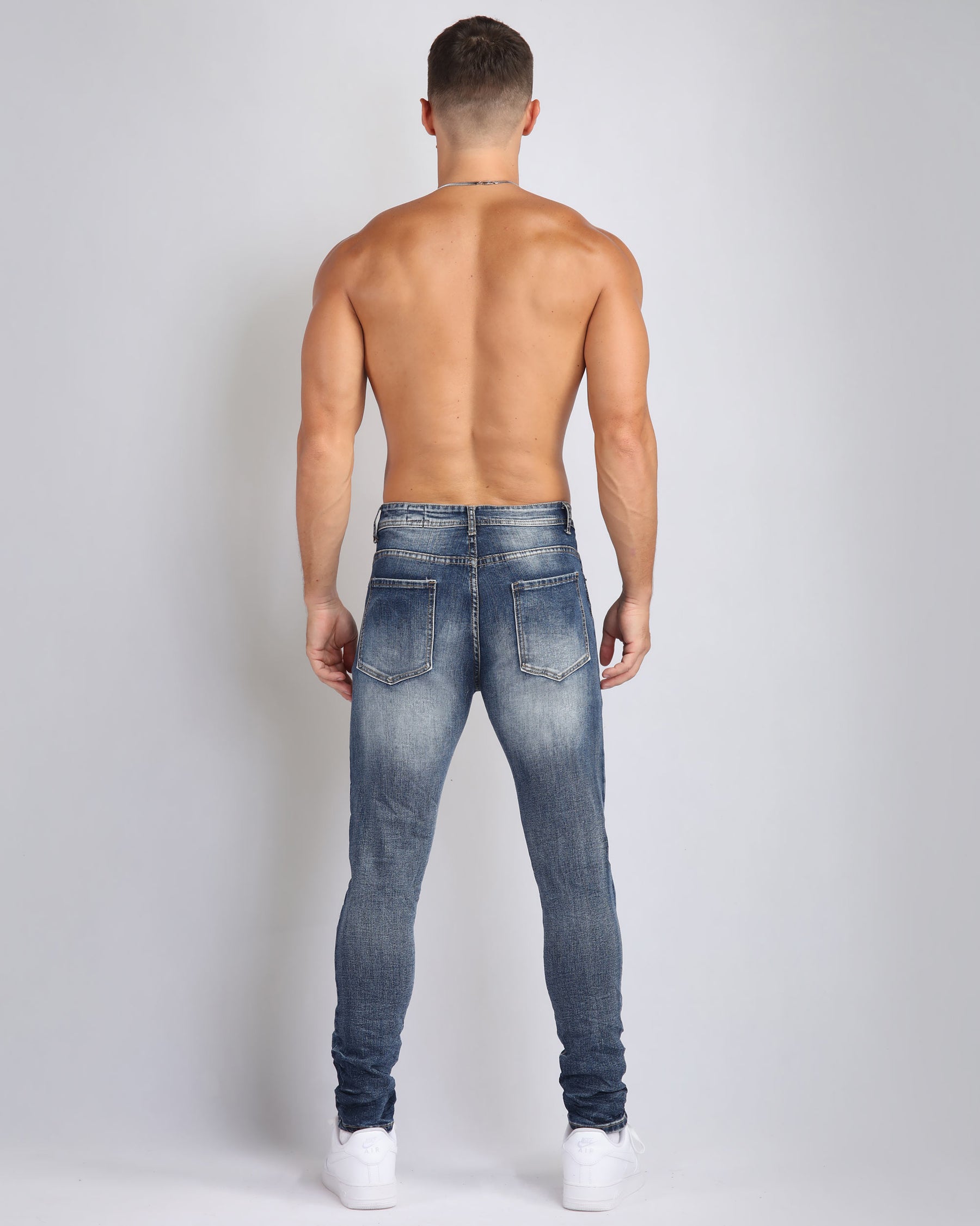Medium Wash Ripped Blue Jeans with Cashew Flower Patch