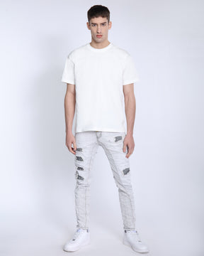 Slim Fit Gray Jeans with Rips, Patches, and Distressed Detailing