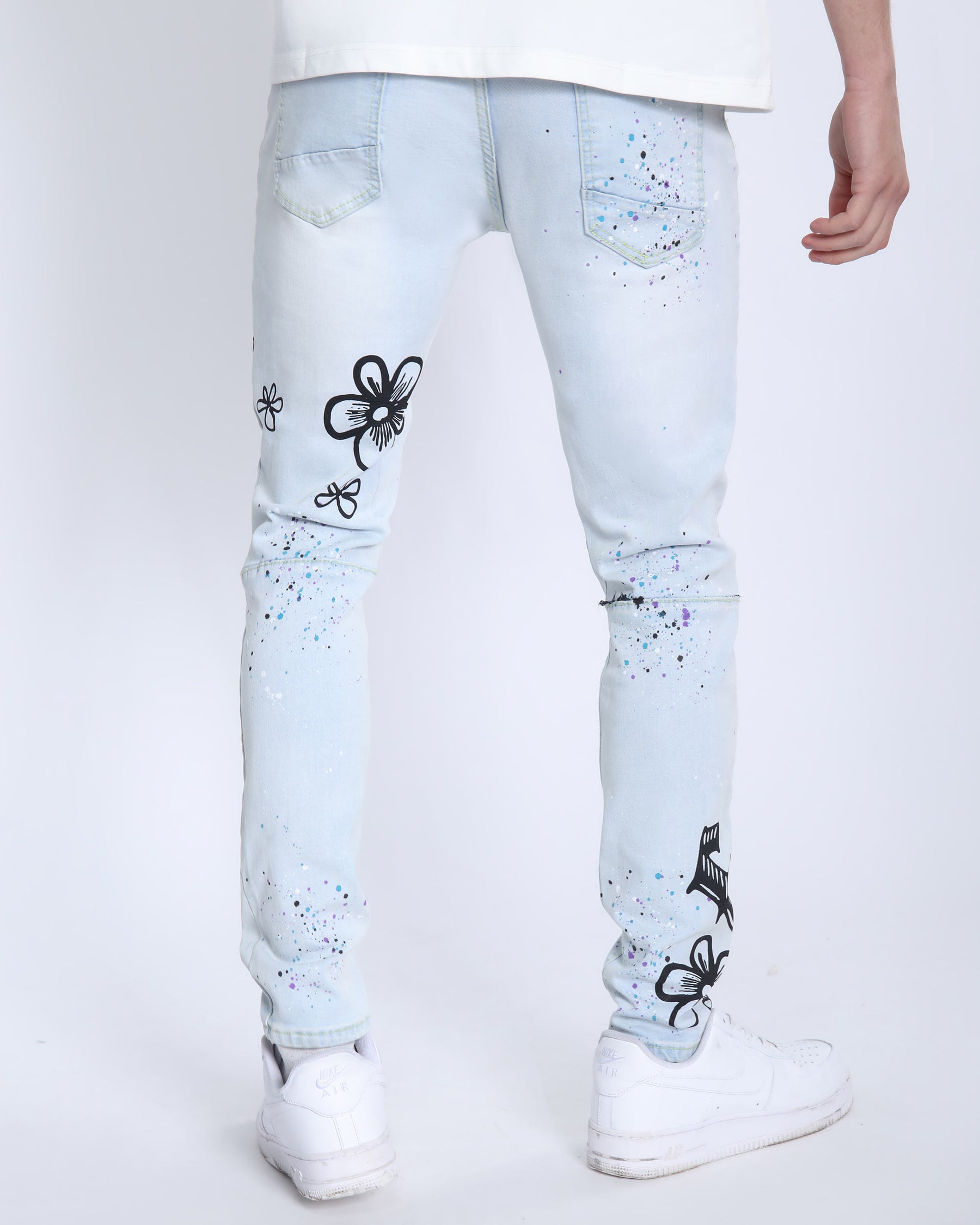 Light Washed Blue Ripped Jeans with Comic Painted