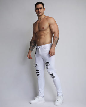 Large Ripped White Jeans with Black Patches