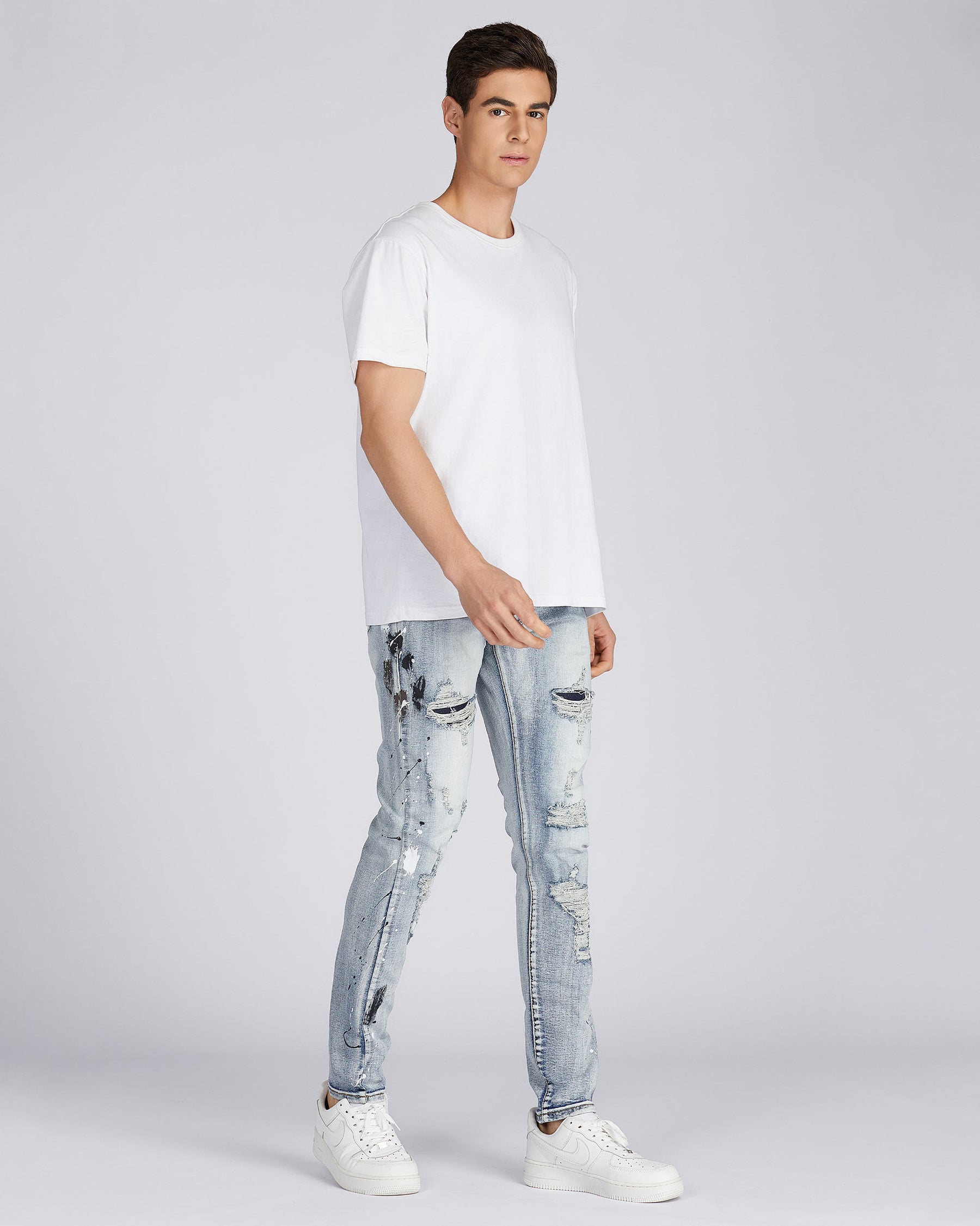 Distressed Blue Jeans with Faded Spray Painted