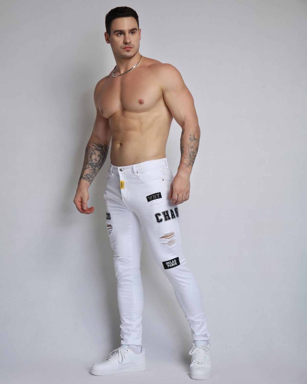 Skinny White Ripped Jeans with Letters Badge