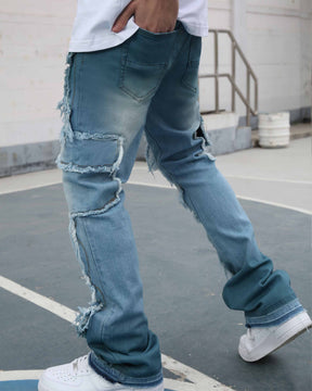 Irregular Blue Flared Jeans with Fringe