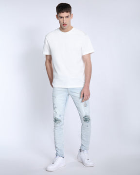 Light Wash Ripped Blue Jeans with Green Cashew flower patch