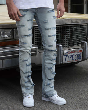 Light Wash Blue Flared Jeans with Cut-to-Shape Ripped