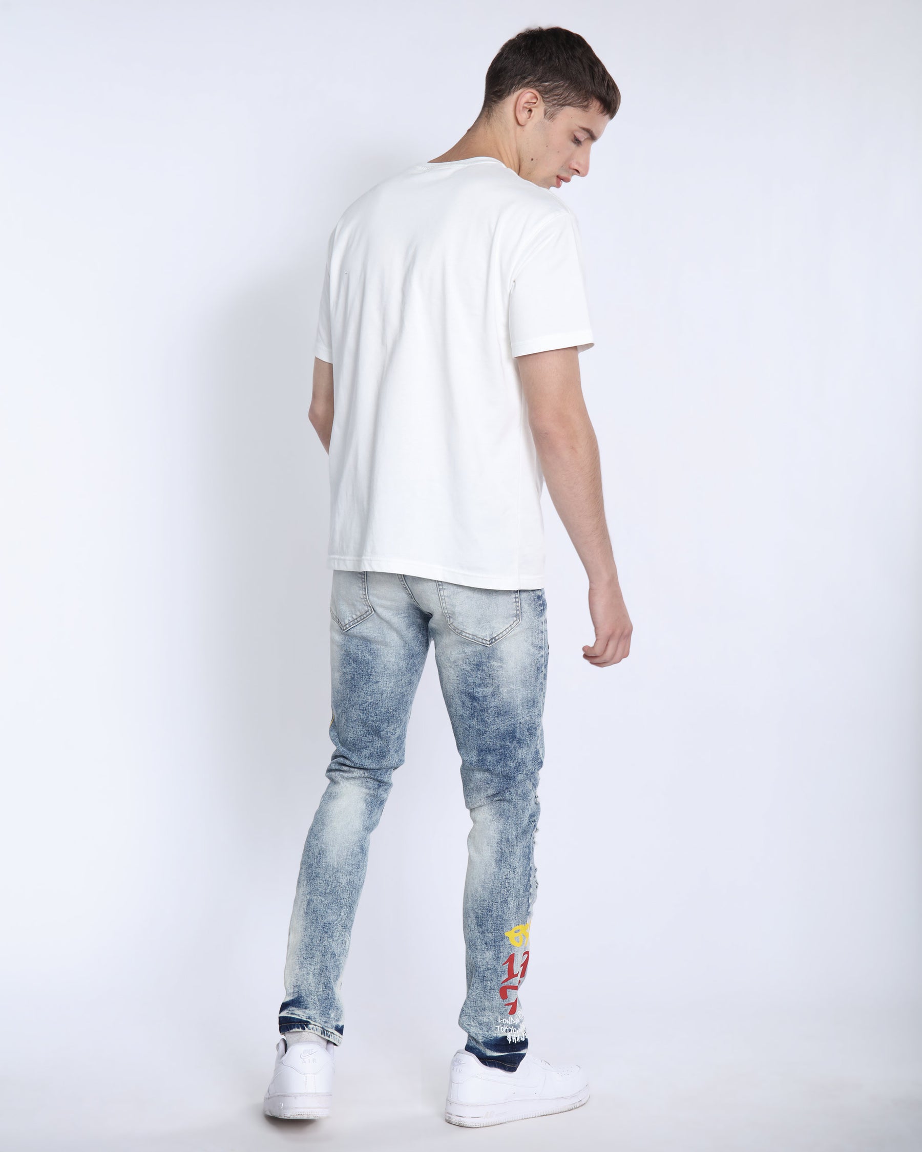 Light Wash Irregular Ripped Blue Jeans with Color Print