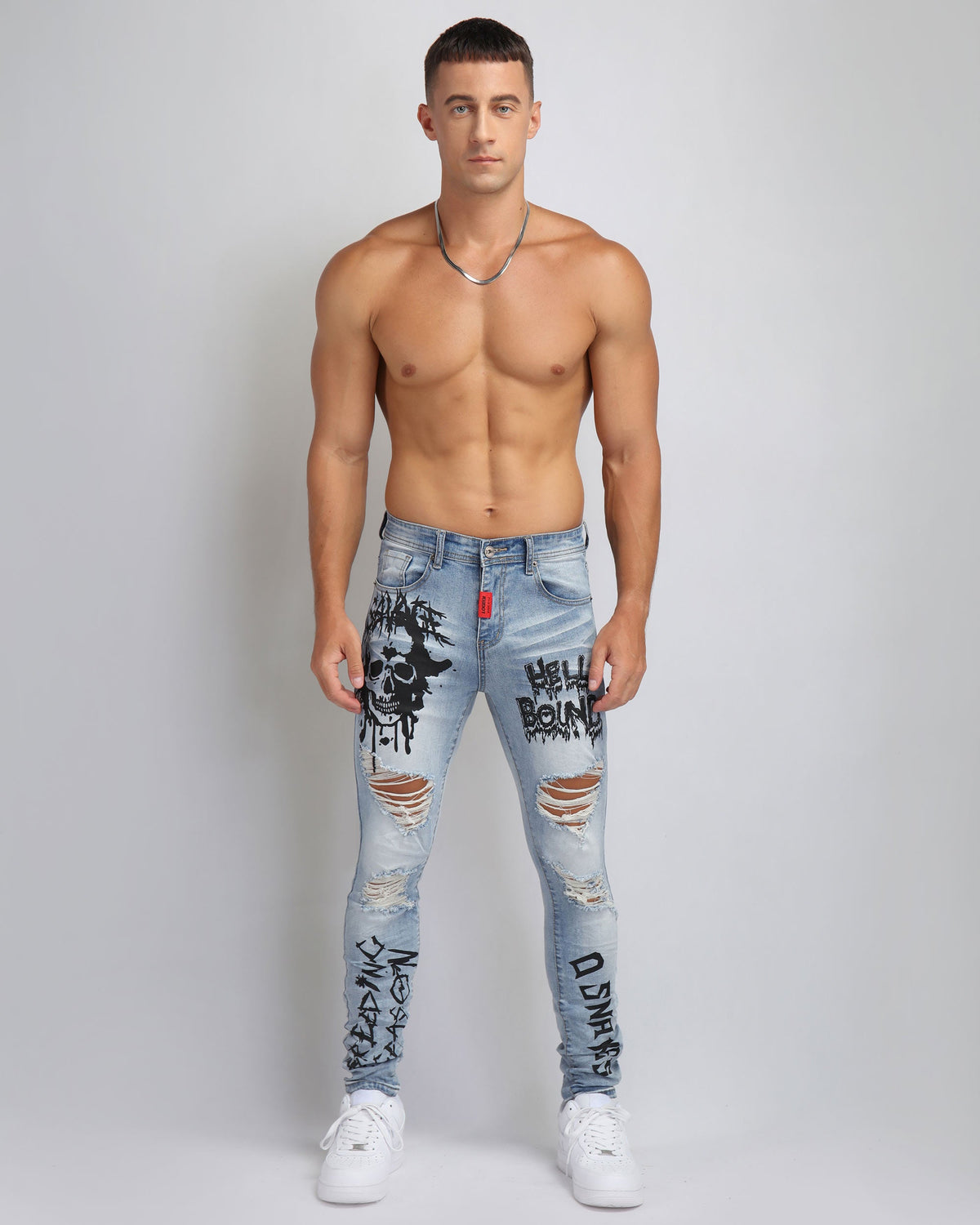 Large Ripped Blue Jeans with Skull Design