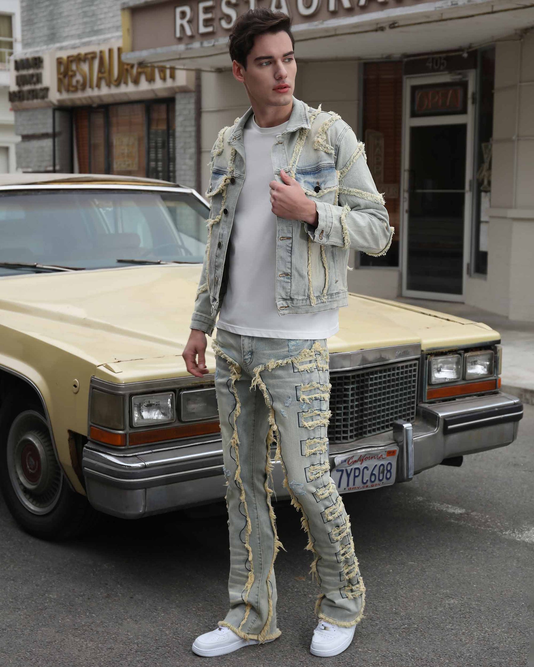 Vintage Blue Denim Jacket with Ripped Stitching