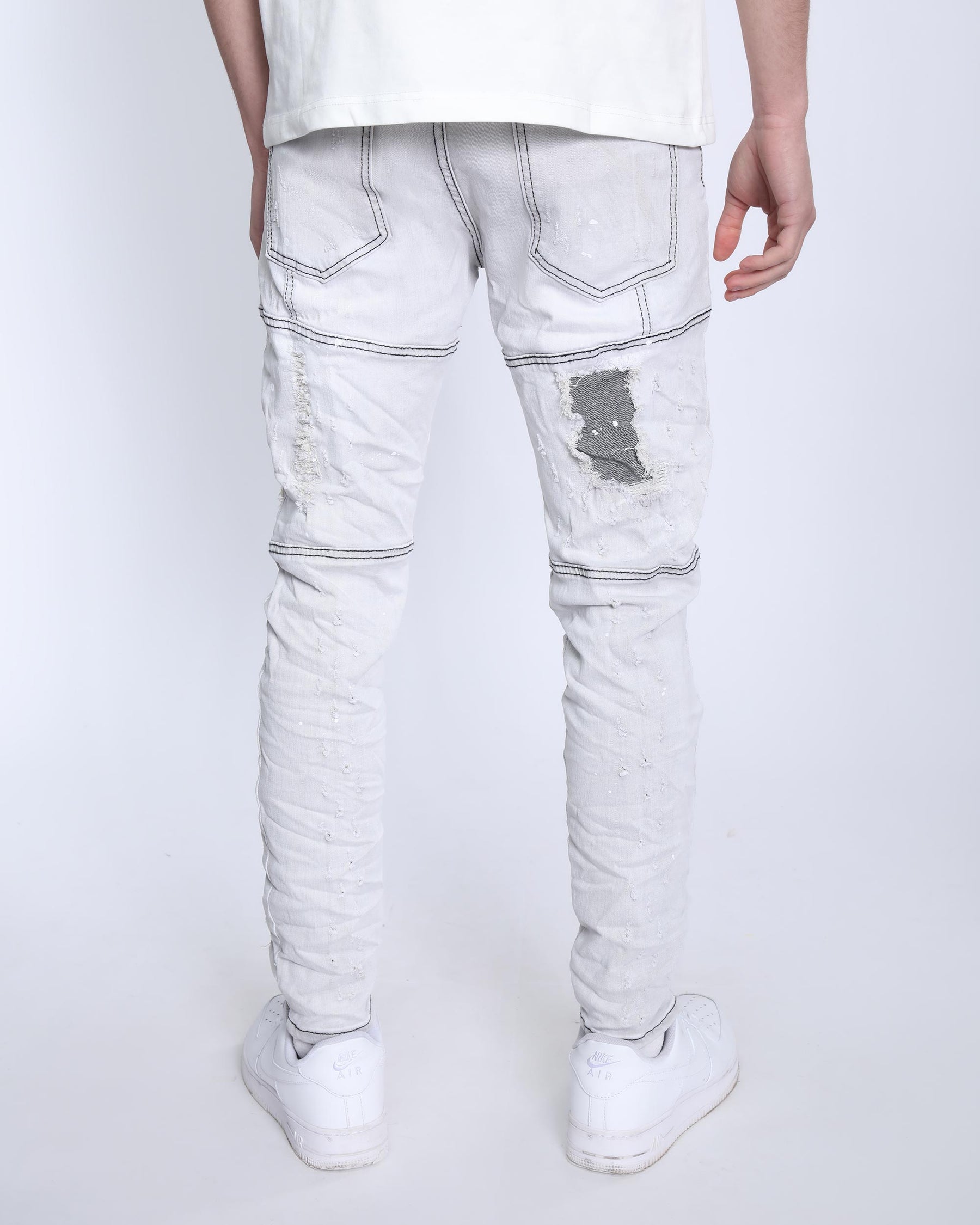 Slim Fit Gray Jeans with Rips, Patches, and Distressed Detailing
