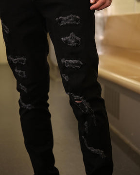 LOGEQI Stylish Black Ripped Jeans with Embroidered Flair