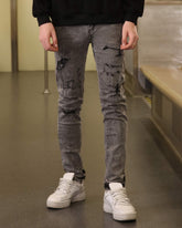 LOGEQI Gray Ripped Jeans with Graffiti-Inspired Style