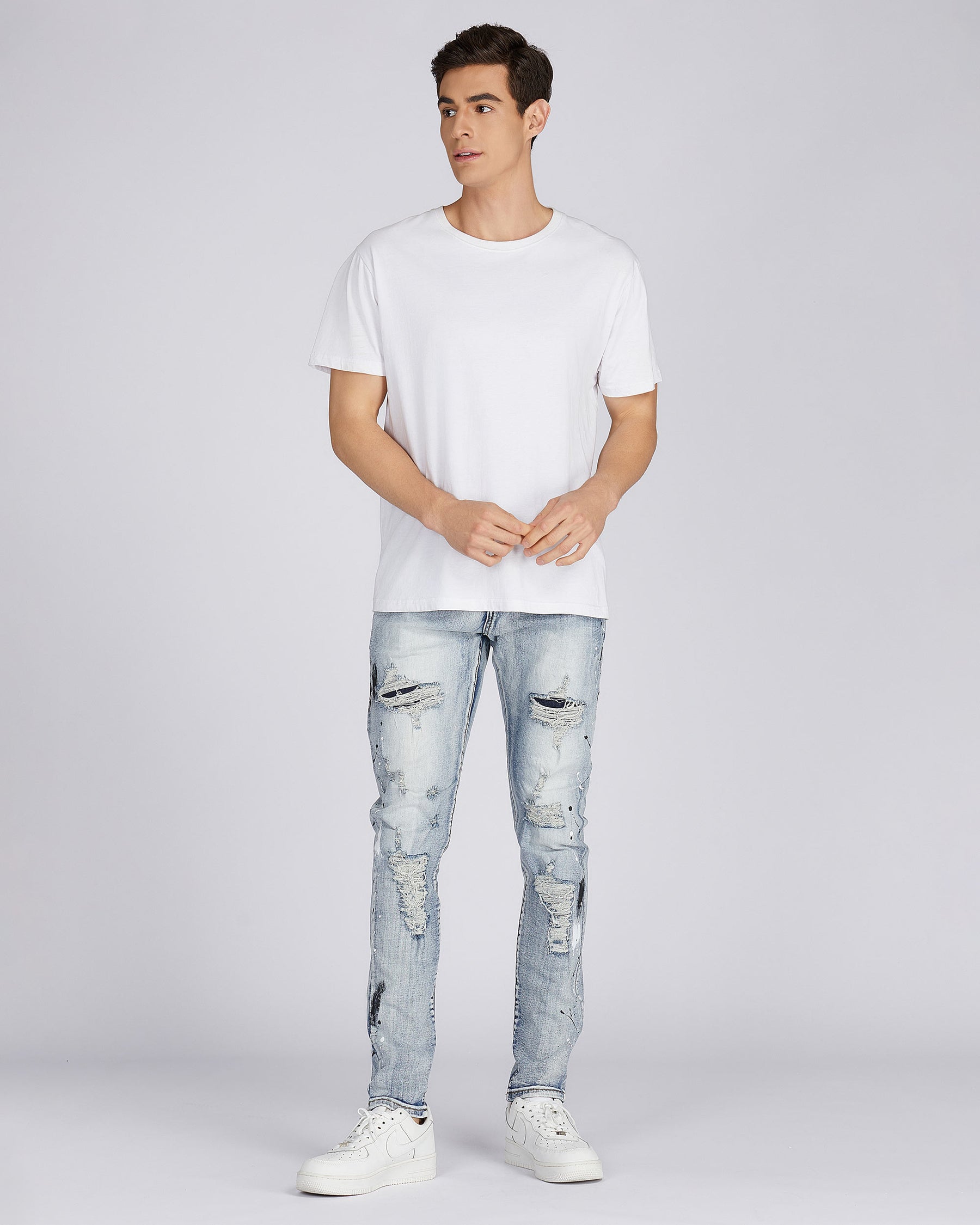 Distressed Blue Jeans with Faded Spray Painted