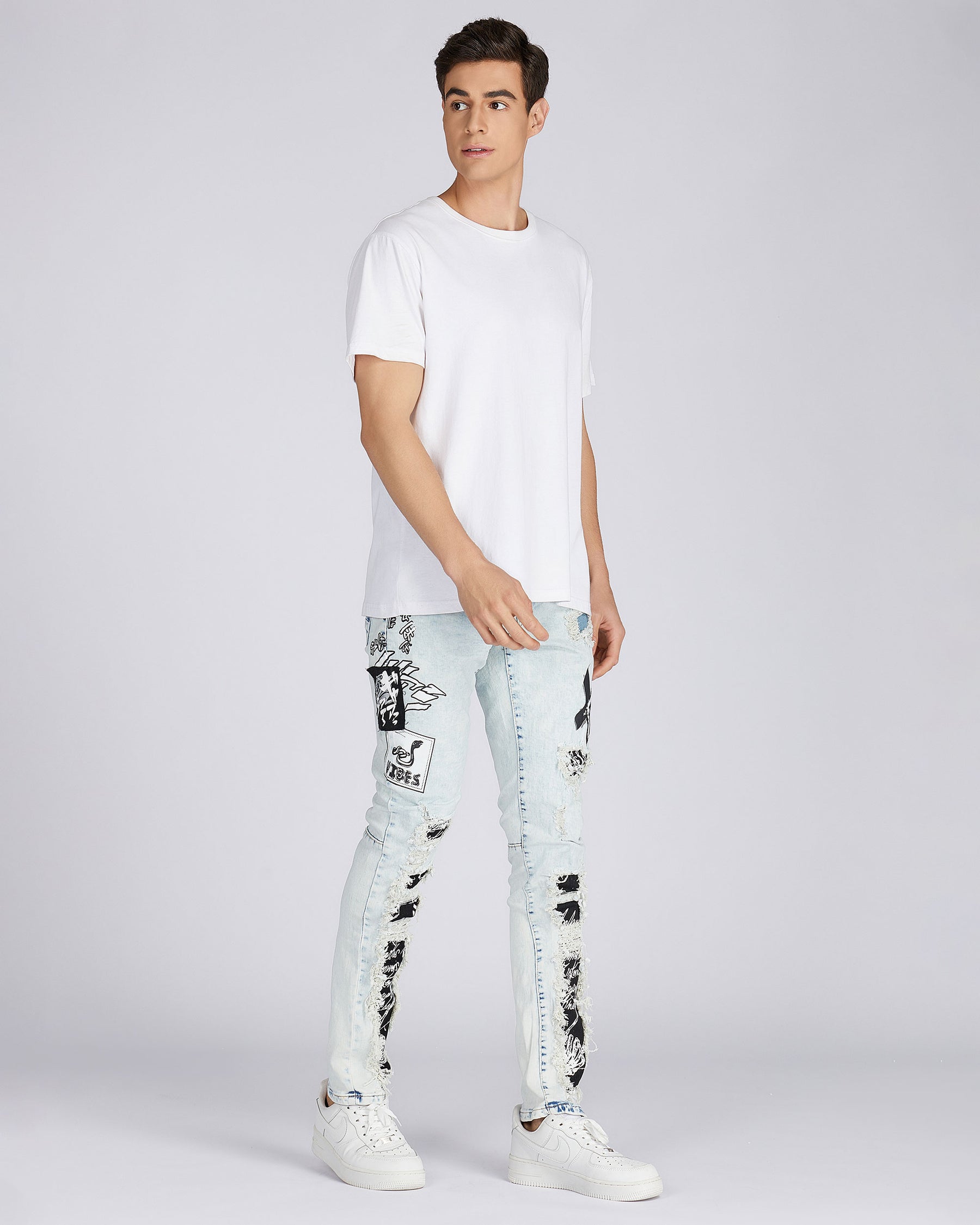 Distressed Blue Jeans with Faded Spray Painted Design