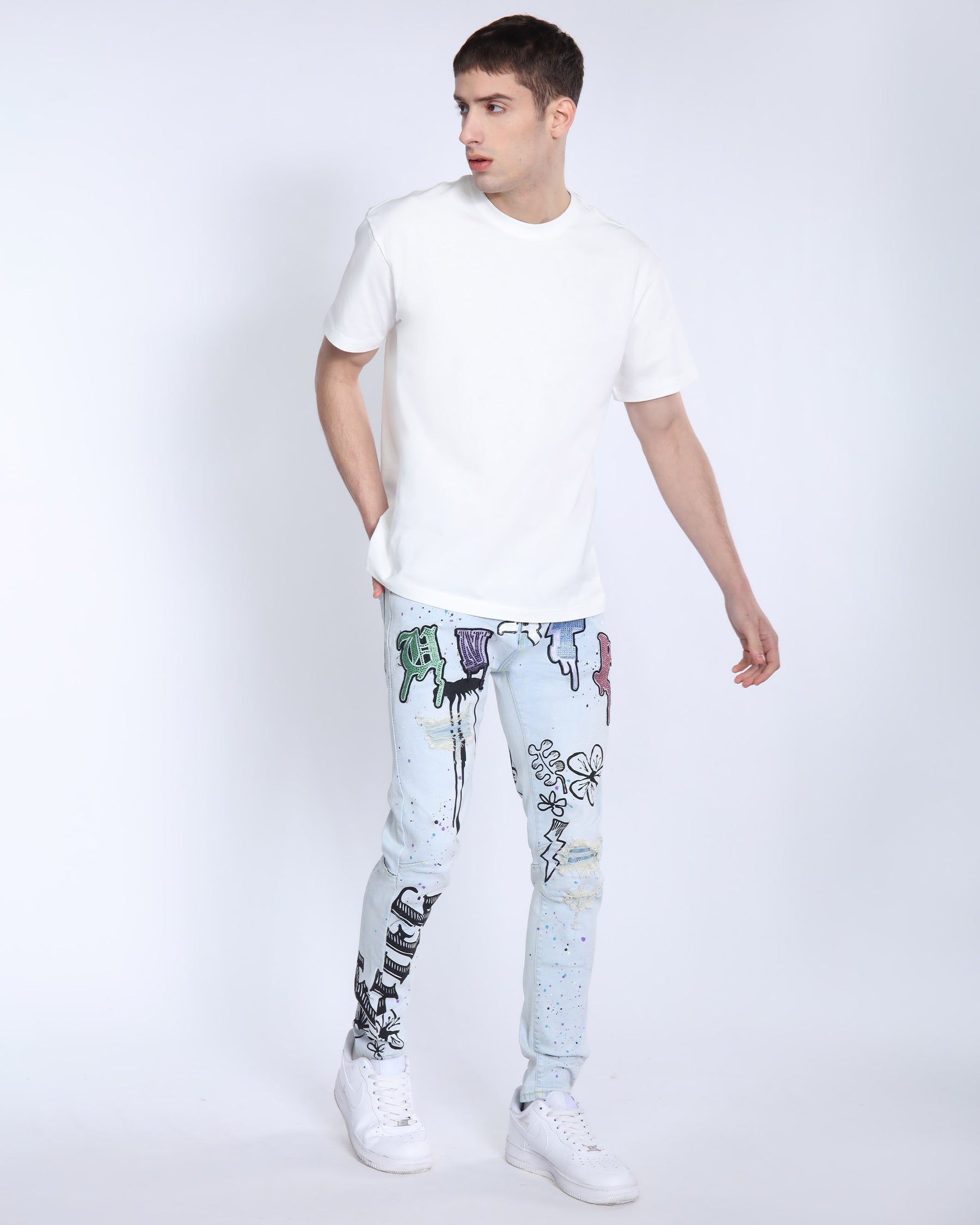 Light Washed Blue Ripped Jeans with Comic Painted