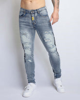 Light Wash Blue Ripped Jeans with Big Letters Embroidered