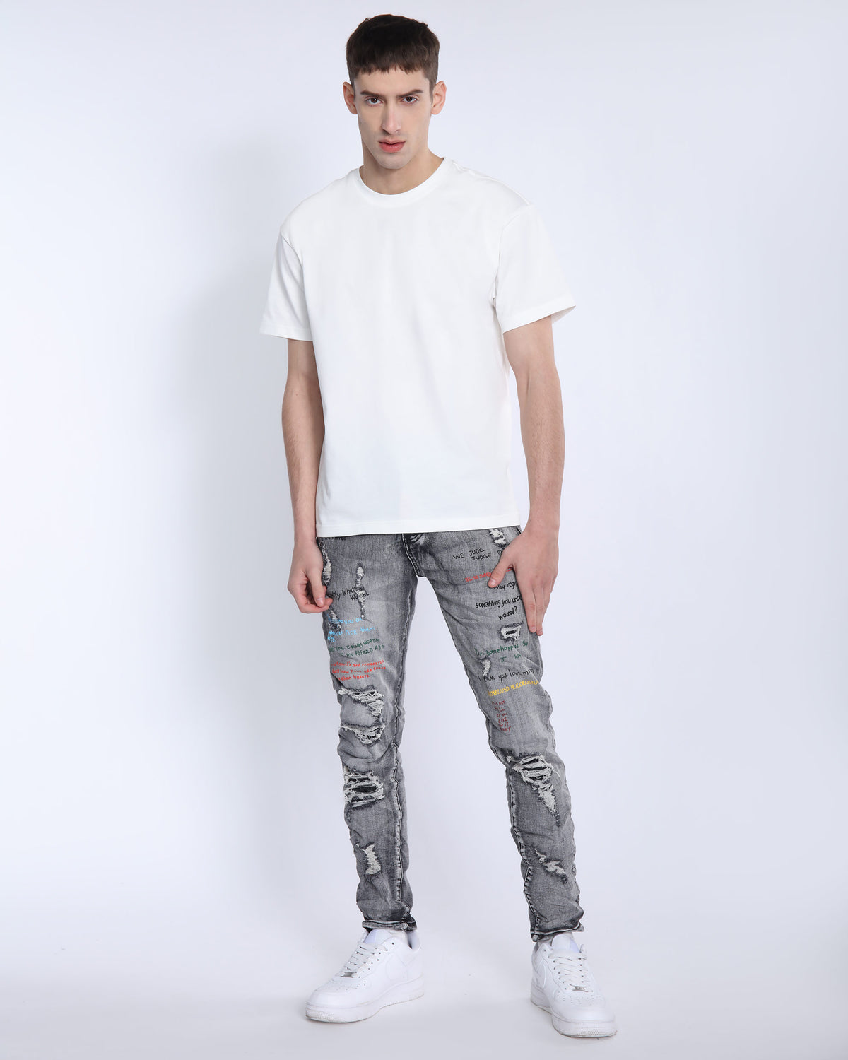 Gray Slim Fit Jeans with Graffiti Style Ripped Design