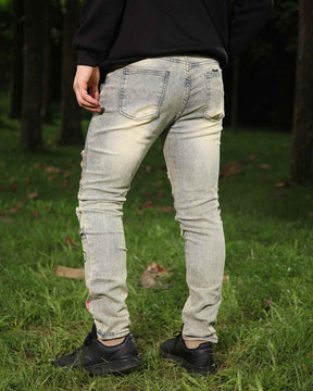 Hip-Hop Style Distressed Ripped Blue Jeans with Graffiti Style