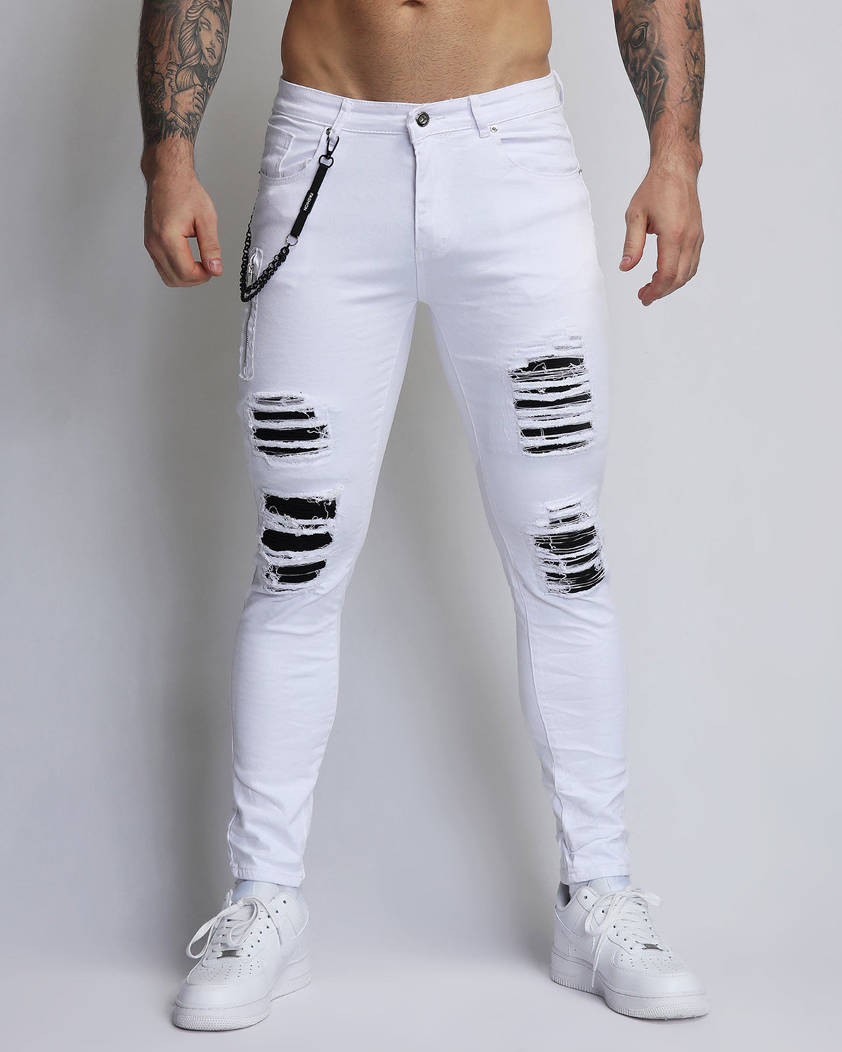 Large Ripped White Jeans with Black Patches