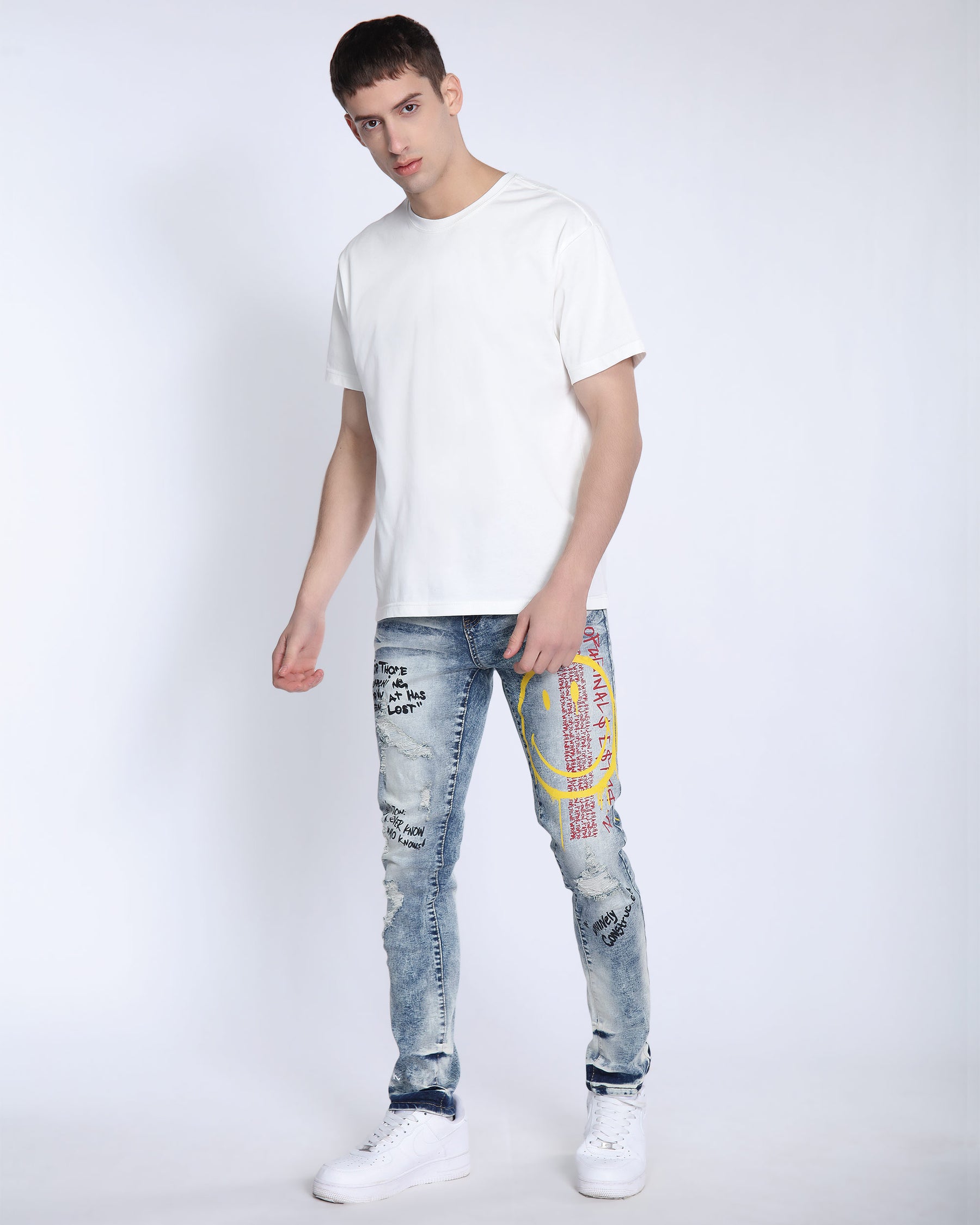 Light Wash Irregular Ripped Blue Jeans with Color Print