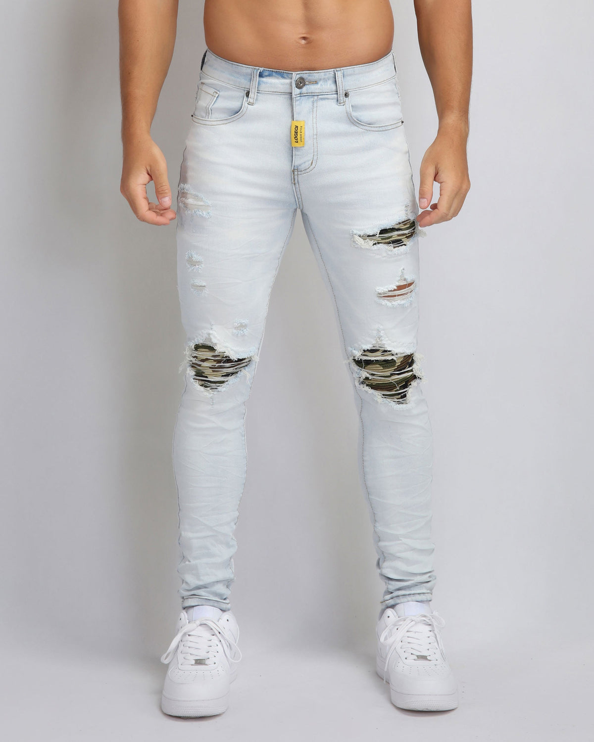 Light Wash Ripped Blue Jeans with Camouflage Patch