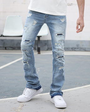 Light Wash Blue Ripped Jeans with Irregular Ripped