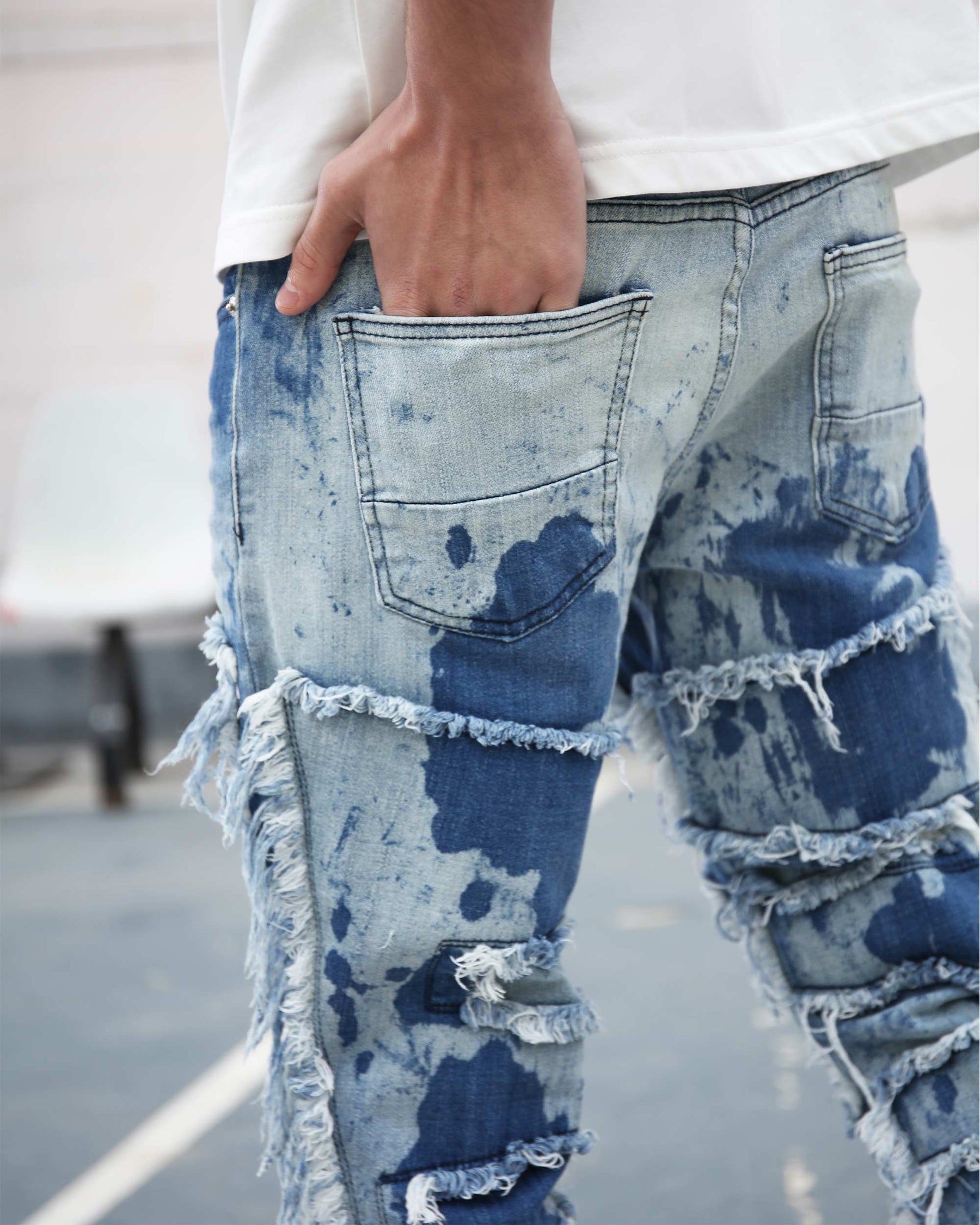 Tie-Dye Flared Jeans with Fringe Detailing