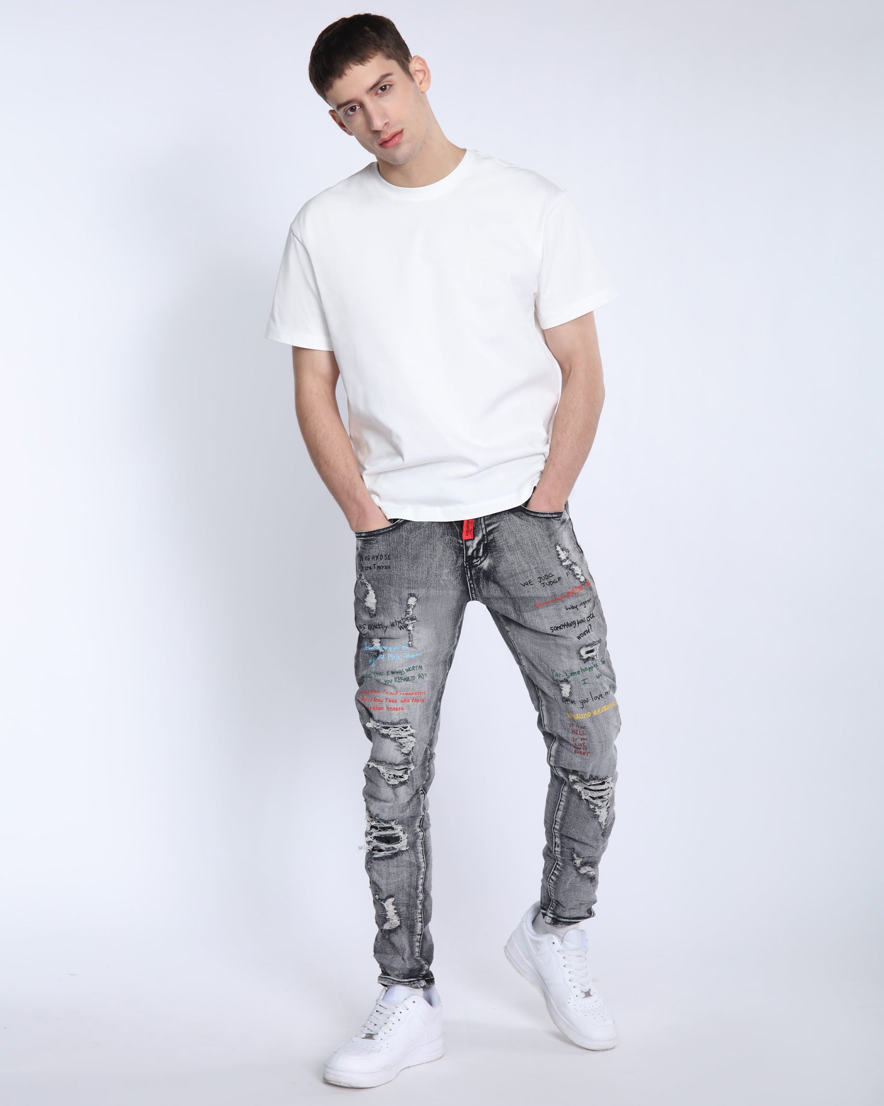 Gray Slim Fit Jeans with Graffiti Style Ripped Design