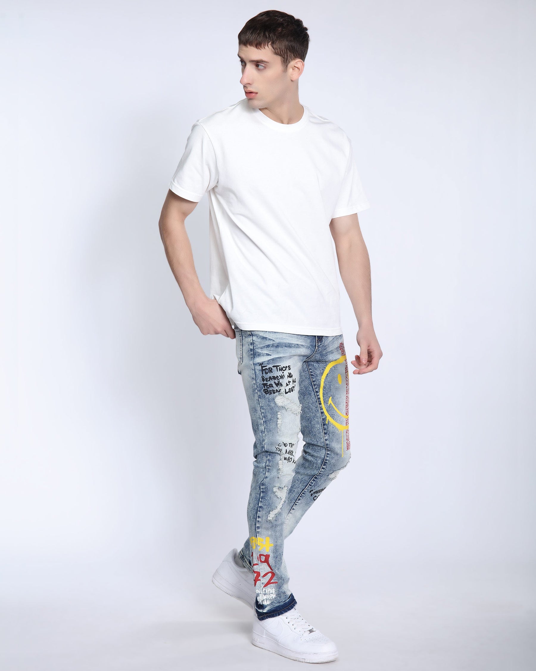 Light Wash Irregular Ripped Blue Jeans with Color Print