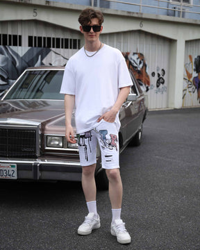 White Ripped Denim Shorts with Colorful Graffiti and Embroidery