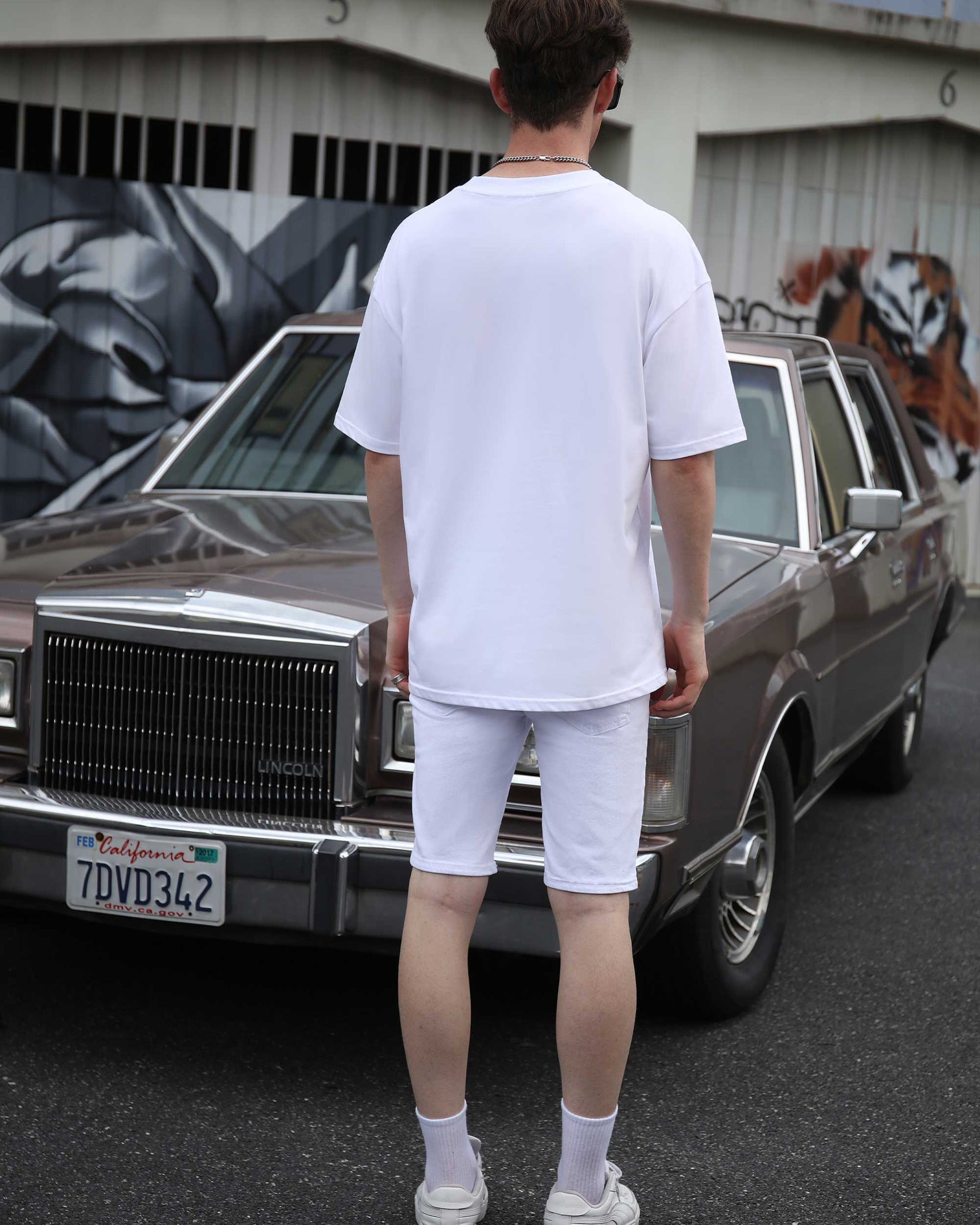 White Ripped Denim Shorts with Colorful Graffiti and Embroidery