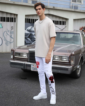 Graffiti Style White Embroidered Ripped Jeans